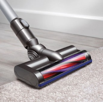 stick vacuum cleaner on carpet